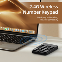 Keyboard numerik mini tombol bulat dual mode 2.4G dan BT, ramping, nyaman, dan memberikan sensasi sentuhan yang halus untuk tablet, notebook, penggunaan kantor, dan rumah.