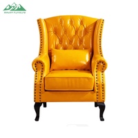 Fauteuil Chesterfield classique personnalisable à une place, capitonné avec boutons et rivets, en similicuir PU rétro, avec pieds en bois assortis