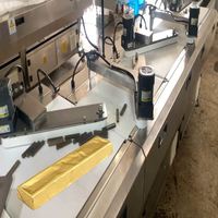 Machine d'emballage automatique de barres chocolatées en feuille d'aluminium avec distribution de colle, fonctionnement rapide, entièrement automatique, conçue sur mesure