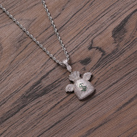 Collier pendentif hip-hop avec ailes et pochette dollar entièrement serties de zircons