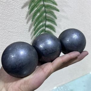 Sfera di Shungite nera naturale 50mm | Sfera di pietra di carbonio lucidata per protezione EMF, purificazione dell'acqua e guarigione spirituale - Product Image 3