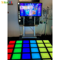 Machine interactive LED commerciale à grille de sol pour jeux de danse sur plancher vibrant, idéale pour parcs d'attractions et centres commerciaux