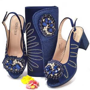 Magnifique robe pour femme, chaussures à talons hauts, sac assorti - Product Image 1