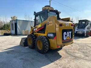 รถตักล้อยาง CAT 2460 สีเหลือง อุปกรณ์ก่อสร้างขนาดกะทัดรัด น้ำหนัก 3000 กก. เครื่องยนต์ 0-2000 ชั่วโมง - Product Image 2