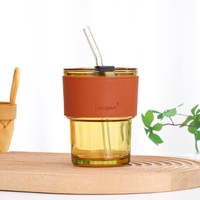 Mug à café moderne en verre transparent jaune de 450 ml de la marque Xuda, avec couvercle et paille, logo personnalisé, sans BPA, compatible lave-vaisselle, unisexe, vente en gros
