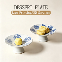 Fabrikant OEM op maat gemaakte dessertbord met steelvormig design voor gebak, fruitsalade, pudding, handgeschilderd blauw geglazuurd keramiek dessertbord