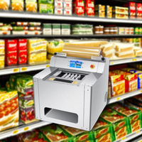 Tafelmodel clingfilm wikkelmachine voor supermarkt fruit- en groentebakjes, verzegeling van voedselverpakkingen, leverancier van verpakkingsapparatuur