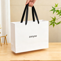 Sacs cadeaux en papier pliables de luxe personnalisés, échantillon gratuit, sacs de shopping écologiques de haute qualité pour mariage et fête