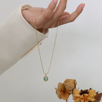 Collar de Acero de Titanio con Colgante de Piedra Ojo de Gato y Cadena de Oro de 18k de Estilo Vintage de Alta Gama para Mujer