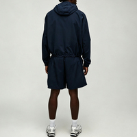 Ensemble de survêtement urbain pour homme en nylon léger, coupe-vent, 2 pièces, avec short et veste à capuche à passepoil contrastant, confectionné sur mesure