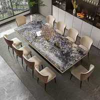 Ensemble de tables à manger modernes de luxe léger avec plateau en marbre et chaises en PU+bois pour la maison et l'hôtellerie