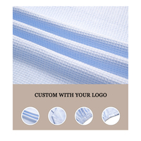 Jupes de bain en tissu gaufré en coton avec logo brodé personnalisé en gros, boutons réglables, jupes de beauté blanches, enveloppe douce pour le corps