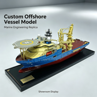 Modèle de navire de soutien offshore personnalisé avec coque bleue, superstructure jaune, fond rouge et pont de grue