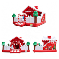 Parc de jeux gonflable avec thème maison de neige et décorations bonhomme de neige pour fêtes de Noël en extérieur et en intérieur