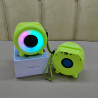 Nouvelle Enceinte Portable Extérieure Mini Sans Fil Étanche en Plastique avec Subwoofer DC, Lumière LED RGB 7 Couleurs et Horloge, Mode Privé Transfrontalier