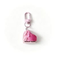 Porte-clés mini piano à queue en résine dégradée, breloque instrument de musique gaufrée avec note musicale, accessoire de sac pour les amateurs de musique