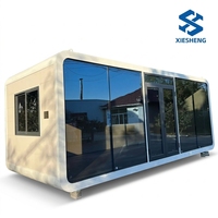 Cabine préfabriquée moderne mini Apple en Chine, résistante aux ouragans, bureau portable, conteneur étanche, maison-cabine