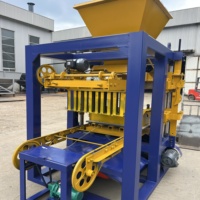Machine à fabriquer des blocs de ciment hydrauliques multi-moules QT4-24