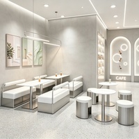 Mobilier de café commercial moderne, banquette en acier inoxydable et table basse ronde pour restaurant