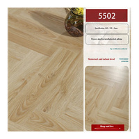 Surface de parquet en PVC SPC à effet chêne élégant pour les conceptions d'intérieur modernes Design graphique à motif à chevrons modèle 3D