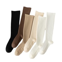 Chaussettes hautes côtelées personnalisées pour femmes, couleur unie, en coton, style décontracté et preppy, vente en gros