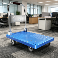 Chariot utilitaire à plateforme en plastique à quatre roues pour supermarché, usine, bureau et entrepôt