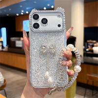 Coque de téléphone de luxe scintillante avec nœud, perles et pendentif pour iPhone 18 17 Pro Max 16 15 14 13, avec cordon perlé et strass oreilles de chat