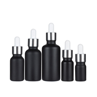 Flacon compte-gouttes d'huile essentielle en verre Boston noir mat avec couvercles Bouteilles d'emballage de parfum de la gamme 5ml-100ml pour sérums de soins de la peau