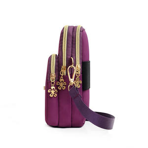 <span class=keywords><strong>กระเป๋า</strong></span><span class=keywords><strong>สะพาย</strong></span><span class=keywords><strong>ข้าง</strong></span>ผู้หญิงสไตล์เกาหลีแบบสามในหนึ่งเดียว ทำจากผ้าไนลอน กันน้ำ ใช้ได้ทั้งแบบสะพายไหล่เดียวและแบบคล้องแขน มีสามชั้น - Product Image 3