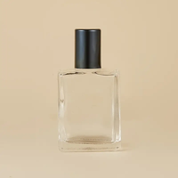 Bouteilles de parfum en verre portables de qualité supérieure de 10ml applicateur à boule roulante conceptions miniatures lisses uniques parfum luxueux fantaisie