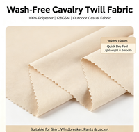 Tissu sergé cavalerie 100 % polyester sans lavage pour pantalons à jambes larges, chemises, coupe-vent, vêtements décontractés d'extérieur – Vente en gros