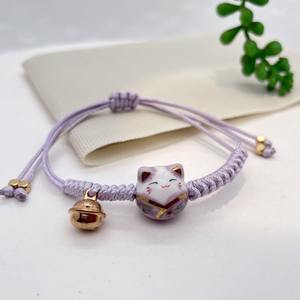 2025 nuovo braccialetto di tessitura del gatto in ceramica del piccolo cartone animato alla moda del gatto <span class=keywords><strong>della</strong></span> <span class=keywords><strong>fortuna</strong></span> fatto a mano tessere braccialetto dello studente - Product Image 3