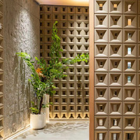 Bloc de cloison décoratif creux léger moderne Jiugongge en ciment PU, brique en plastique ABS, acier, pour hôtel tendance