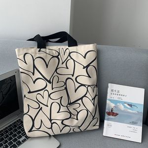 Sac fourre-tout en toile minimaliste à imprimé cœurs, motif cœurs en ligne noire, sac à bandoulière décontracté pour le shopping et l'usage quotidien - Product Image 4