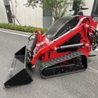 Chargeuse compacte sur chenilles pré-inspectée avec scie à roche et compacteur à plaques pour les projets de rénovation de jardins et de cours de villas