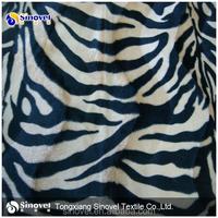 Fabrication chinoise Polyester fausse fourrure tissu fausse fourrure tissu de conception animale pour coussin