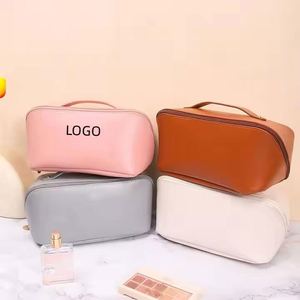 Ulikeke Wholesale Custom Logo Waterproof Toiletry Cosmetic Bags PU Leather <b>Pillow</b> Cosmetic Travel Makeup Bag With Zipper - Product Image 1