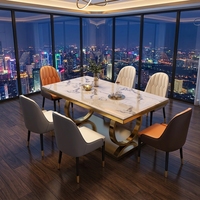 Table à manger extensible moderne de luxe avec plateau en pierre frittée marbre noir Marquina et base en acier inoxydable plaqué or pour villa