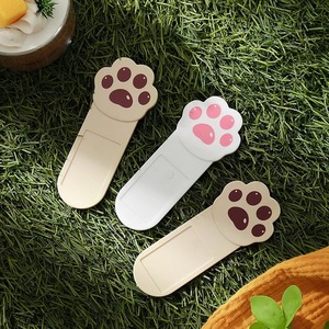 Elevador de asiento de inodoro con diseño de huellas de pata, material PP, color blanco-café, estilo contemporáneo, para uso higiénico. - Product Image 2