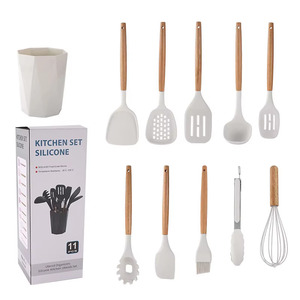 Juego de 11 utensilios de cocina de silicona con mangos de madera, antiadherentes, resistentes al calor, con organizador. - Product Image 1