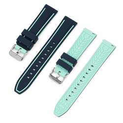 Bleu roi + vert, avec clous d'oreilles interchangeables.