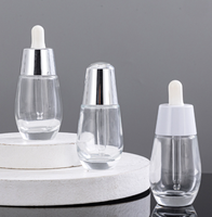 Vente en gros de flacons compte-gouttes en verre transparent de luxe personnalisés de 30 ml et 50 ml, contenants vides pour huiles essentielles, soins de la peau, sérums