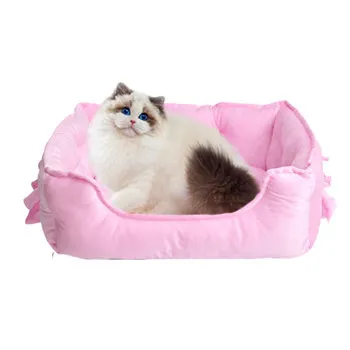 Nuevo diseño de felpa cálida de lujo camas para perros pequeños Color caramelo lindo Bowknot cómodo impermeable cama nido para mascotas