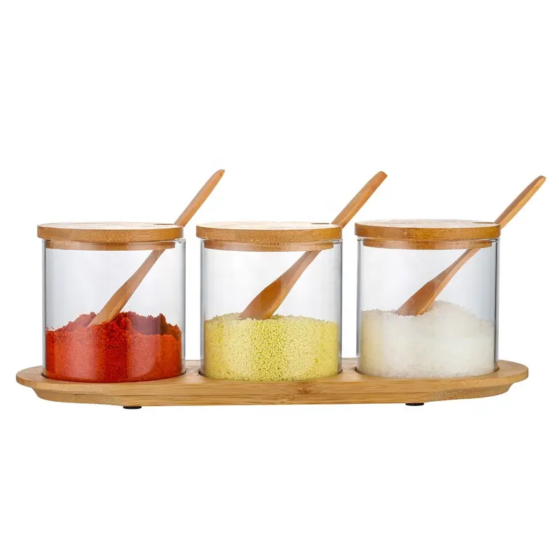 حاويات توابل زجاجية للمطبخ الأعلى مبيعًا طقم برطمانات توابل من زجاج البورسليكات العالي مع طبق خشبي