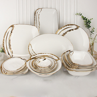 Service de vaisselle à bord doré, luxe d'inspiration européenne, bols et assiettes en céramique blanche avec accents dorés