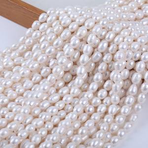 Perlas de Agua Dulce Naturales Hechas a Mano en Zhuji, de 9-10 mm, Forma de Metro, para Joyería DIY, Accesorios para Collares, Perlas Sueltas con Orificio, Tipo Arroz - Product Image 1
