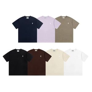 Camiseta AMI de moda con logo pequeño bordado, cuello redondo, manga corta, holgada, informal, para hombre y mujer, combina con todo, para verano. - Product Image 1