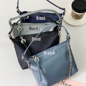 Bolso de Hombro Tipo Cubo de Diseño Novedoso y Popular para Mujer, con Cremallera Metálica, Versátil, de Moda Long-xiang, Sencillo y de Mano - Product Image 1