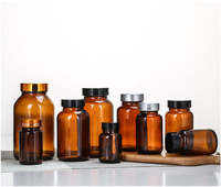 Vente en gros 60ml 75ml 100ml 120ml 150ml bouteille de médecine en verre marron bouteille de Capsule en verre ambre avec couvercle à vis en or
