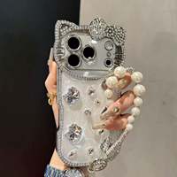 Coque de téléphone 3D chat dessin animé scintillant avec diamants, étui de protection en cristal pour iPhone 13 14 15 16 17 Pro Max avec bracelet
